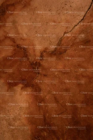 Tło do fotografii kulinarnej i produktowej Amber. Jego powierzchnia przypomina kamień, który zatrzymał światło popołudnia Kolory różne odcienie brązów. Jest to wzór bardzo malowniczy i nada wyjątkowości każdemu kadrowi. Ten brązowo miodowy kolor sprawdzi się do jesiennych i zimowych styliazji.