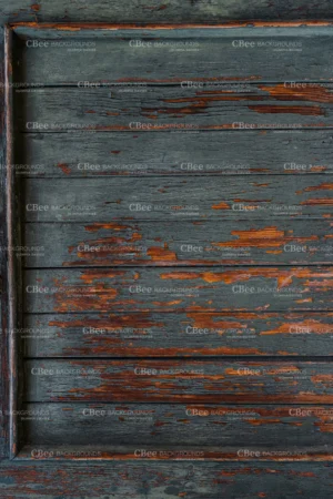 Tło do fotografii kulinarnej i produktowej. Kolory niebieski, szary z pomarańczowymi elementami w postaci odprysków farby. Winylowe tło do fotografii, zwijane, trwałe, drukowane. Wzór imitujący stare drewniane drzwi w kolorze niebieskawo szarym z pomarańczowymi przetarciami.