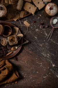 Tło do fotografii kulinarnej i produktowej. Kolory różne odcienie brązow. Winylowe tło do fotografii, zwijane, trwałe, drukowane. Wzór imitujący kamień, marmur w różnych odcieniach brązu.